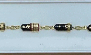 Pulsera de banderas oro de ley de 18 kts